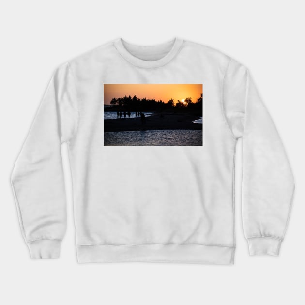 Crowd Silhouette at Sunset Crewneck Sweatshirt by andykazie